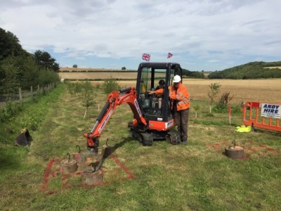 Ed helps a young visitor with the popular digger challenge
