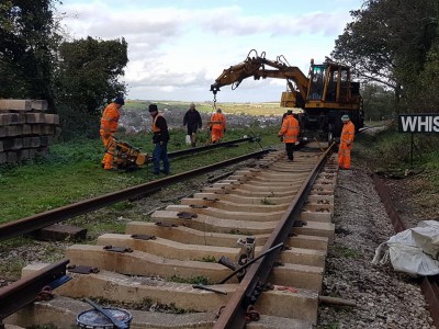 The road-railer in action moving rails.