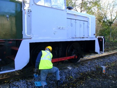 Brian wielding his brush on 5576's wheels and running gear.